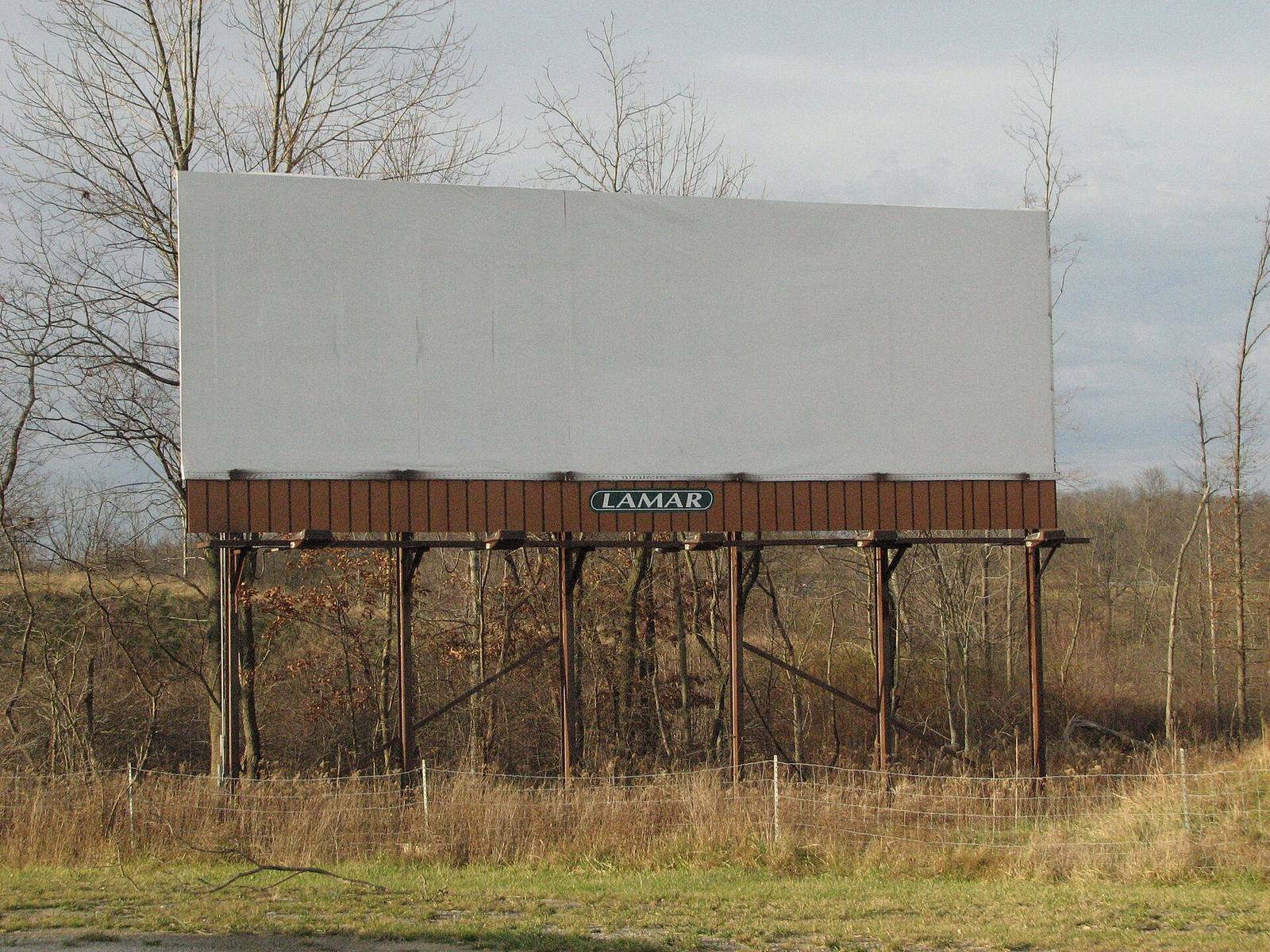 Highway billboard at dusk